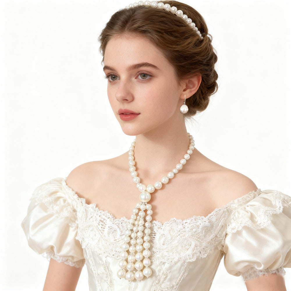 Elegant Pearl Sweater Chain Set